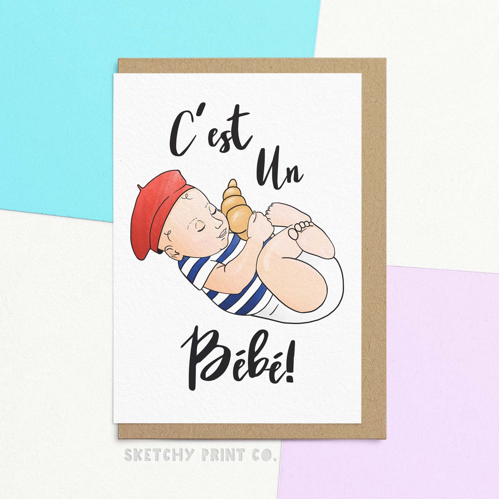 Funny New Baby Card reading "C'est Un Baby!" French for "It's A Baby!" for Mum and Dad. Welcome their new baby with our cute baby shower card "C'est Un Bébé" (It's a Baby!), perfect for chic parents! FSC-certified paper and compostable packaging make this thoughtful greeting even more of a sweet deal! Bonjour bébés!