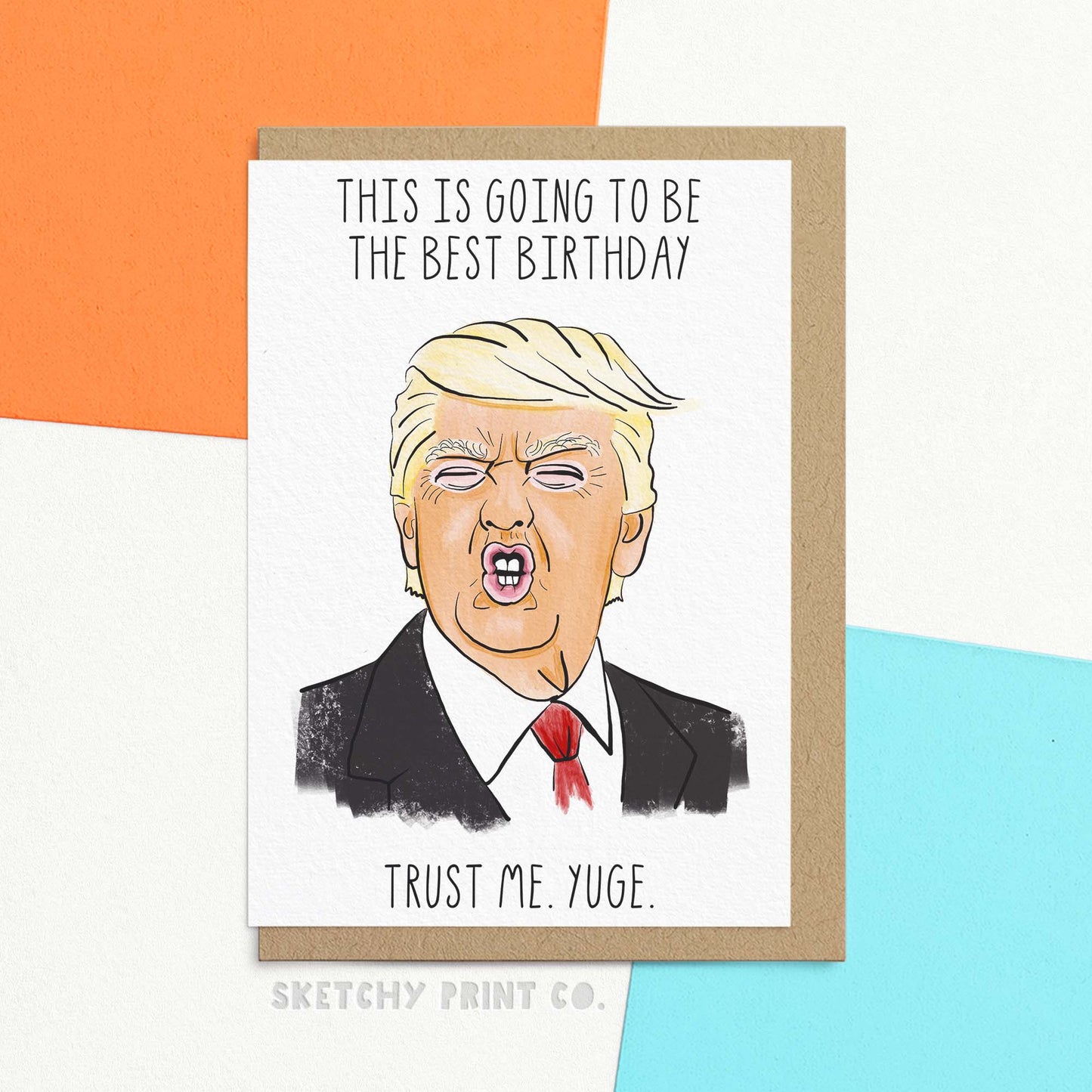 Funny birthday card featuring Trump illustration and reading 'this is going to be the best birthday. trust me. yuge.'. Shown with Kraft envelope.