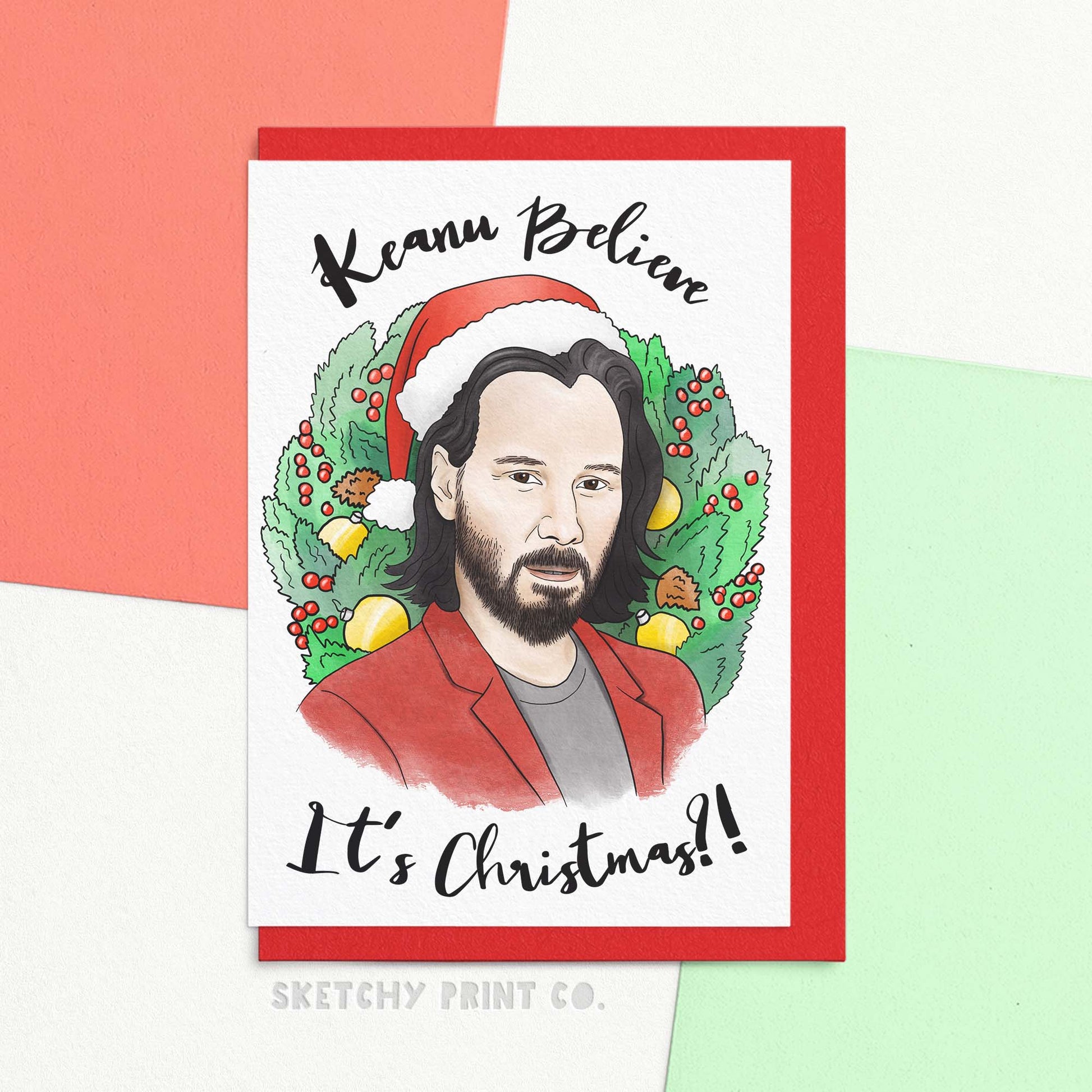 funny Christmas wishes card saying Keanu believe it's Christmas?! With an artists interpretation of a handsome actor in a Christmas hat surrounded by a wreath. Get ready to bask in the holiday cheer with this excellent Christmas card! Featuring funny Christmas wishes and dastardly good looks, this card is perfect for anyone who can't quite believe it's Christmas already. Make them feel like royal Christmas dudes and send this card to all your loved ones!