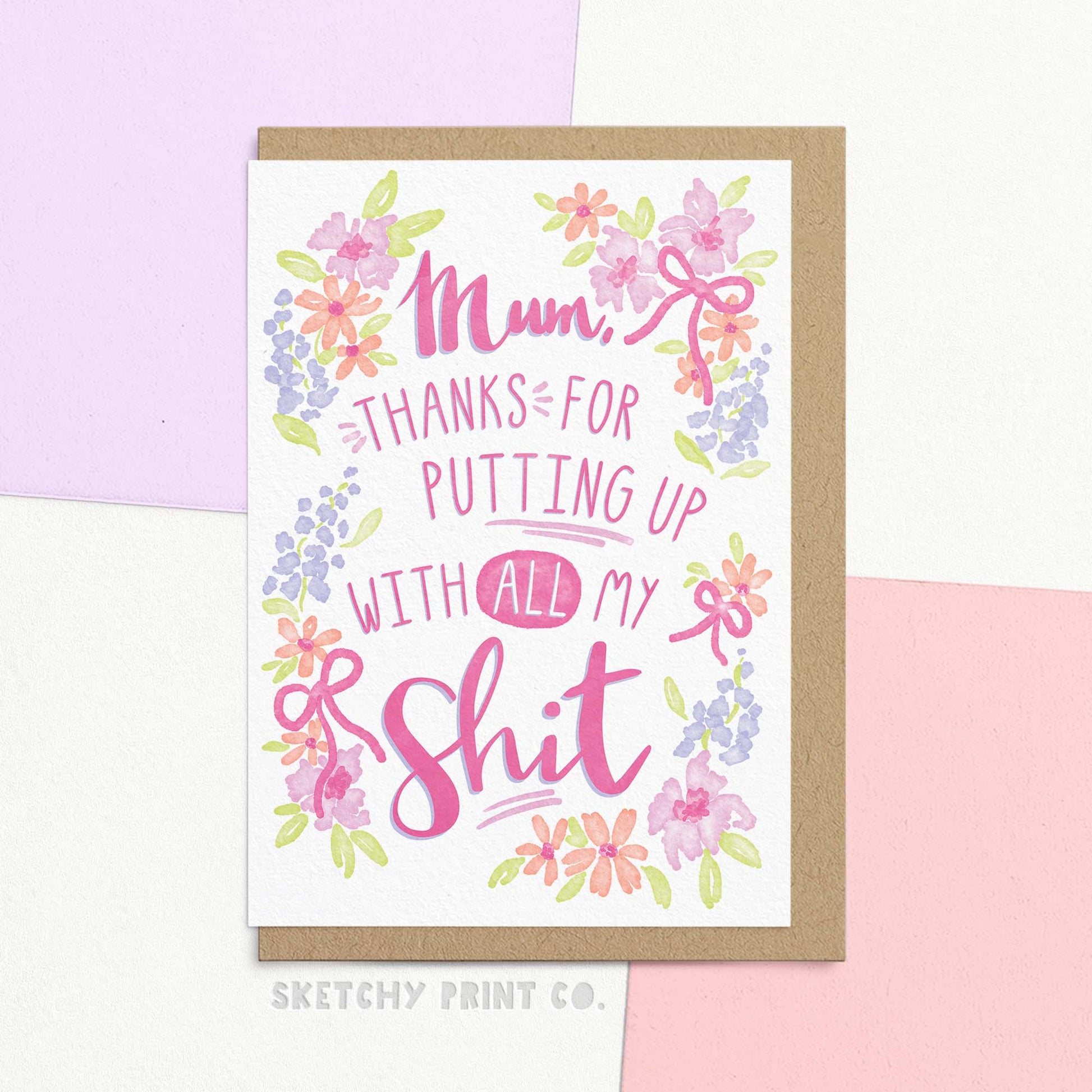 Funny floral watercolour Mother's Day card reading 'Mum, thanks for putting up with all my shit!' in beautiful lettering. Shown with a Kraft envelope.