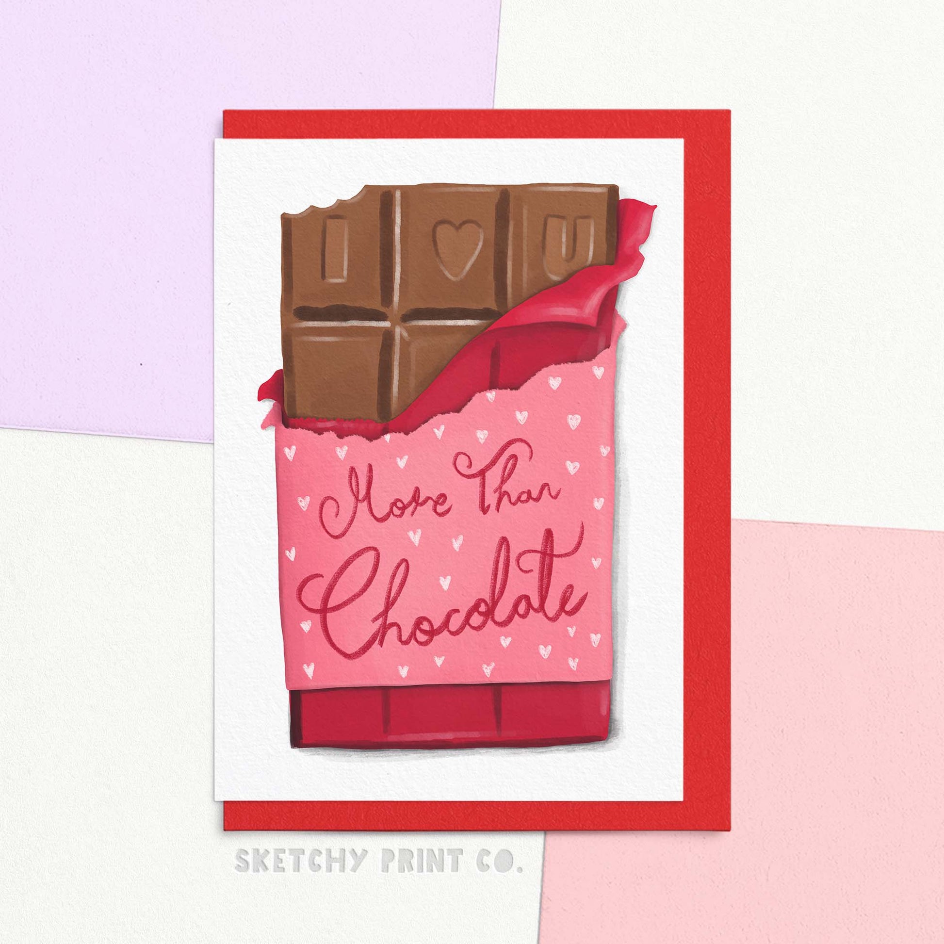 Funny Valentine's Day card with chocolate bar illustration reading 'I ❤️ U more than chocolate'. Shown with envelope.