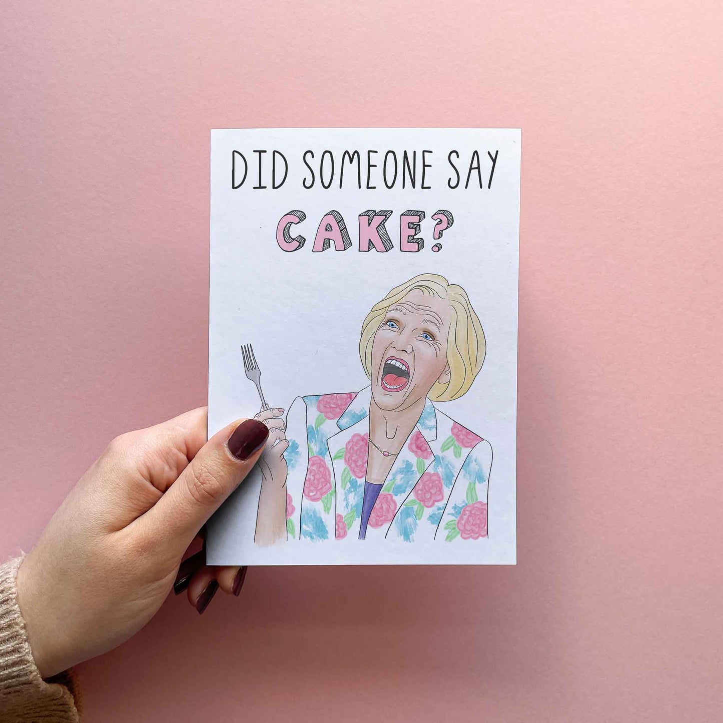 Funny Birthday Card for mum. Birthday greetings for sister funny or birthday wishes for best friend. Birthday wishes card reading "did somebody say cake?" featuring water colour of star baker berry by sketchy print co. Card held in hand for size reference.