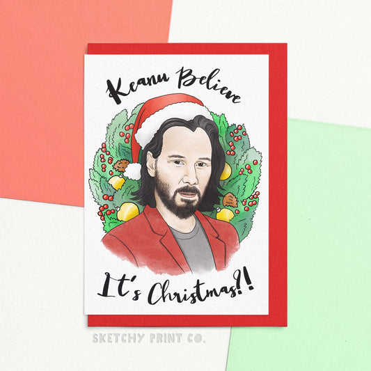 funny Christmas wishes card saying Keanu believe it's Christmas?! With an artists interpretation of a handsome actor in a Christmas hat surrounded by a wreath. Get ready to bask in the holiday cheer with this excellent Christmas card! Featuring funny Christmas wishes and dastardly good looks, this card is perfect for anyone who can't quite believe it's Christmas already. Make them feel like royal Christmas dudes and send this card to all your loved ones!