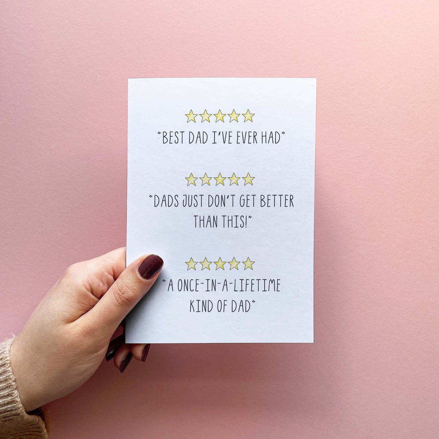 Funny father's day card with 5 star reviews saying 'best dad I've ever had' 'dads just don't get better than this!' 'A once in a lifetime kind of dad' held in hand for size reference. If your father jokes constantly, beat him to the dad joke of the day with this personalised Father's Day card!