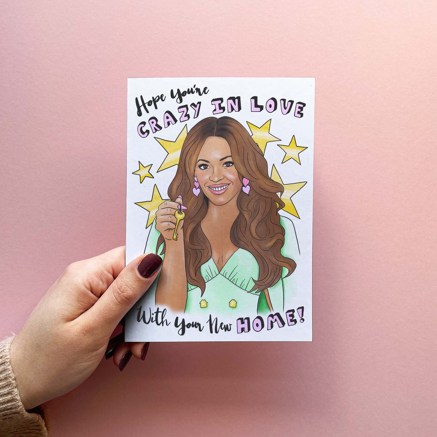 Funny new home / housewarming card reading hope you're crazy in love with your new home! Featuring an illustration resembling Beyonce holding house keys