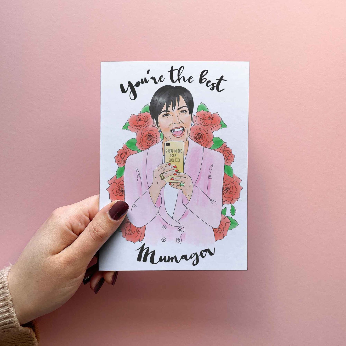 Funny Mother's Day Card and gift ideas for mum. Card reading you're the best mumager, kris Jenner recording using a phone with a case that says you're doing great sweetie!