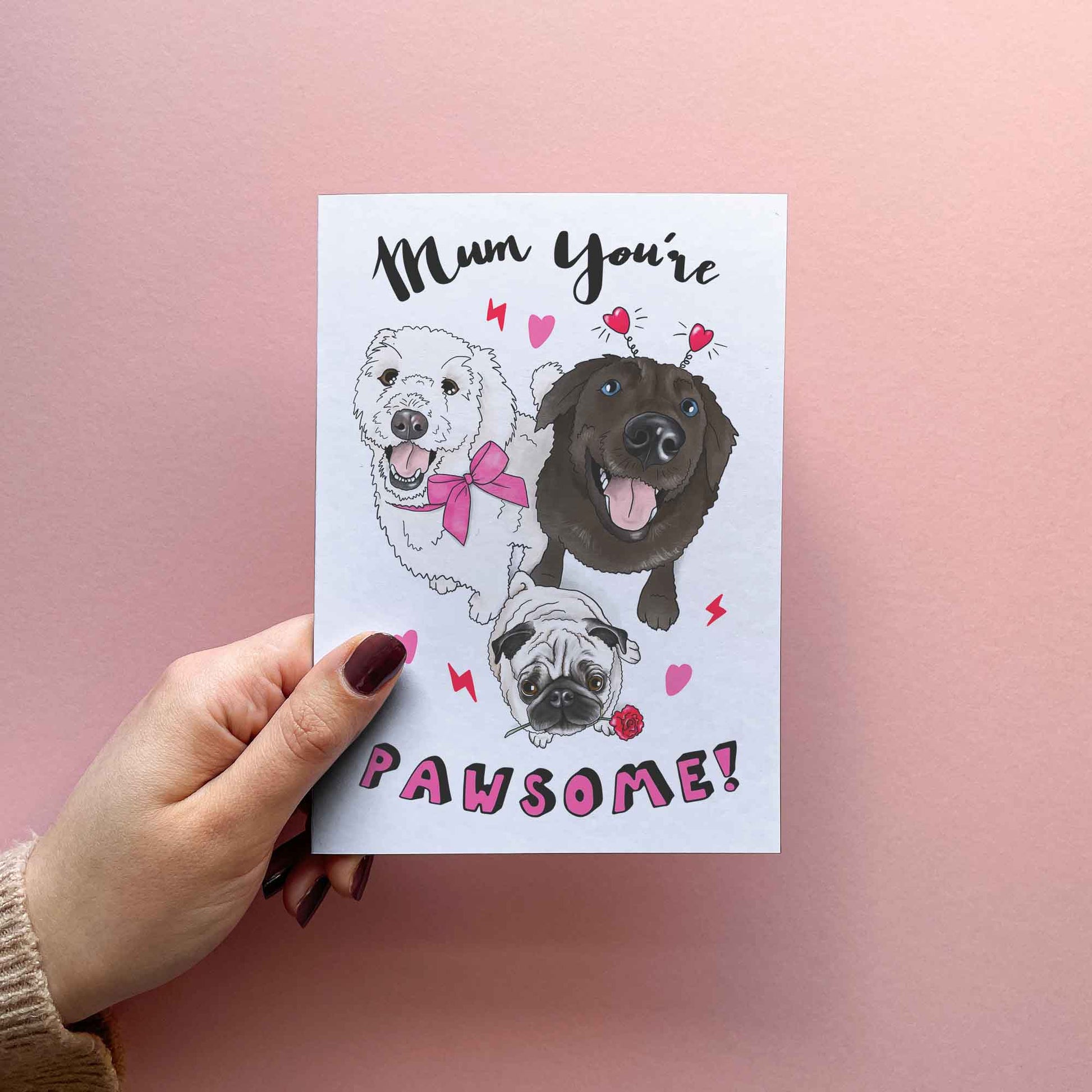 Funny mother's day card for dog mum. mother's day ideas for mom. Card Thea reads 'Mum you're pawsome!' with cute illustrations of a pug, a Labrador and a white fluffy dog.