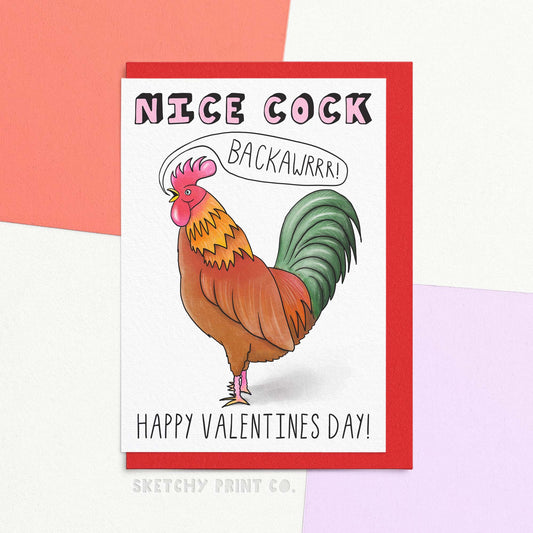 Rude Valentines Day card reading nice cock happy valentines day, with a funny illustration of a cockerel saying backawrrrr! A fine pecker! Looking for a cheeky way to show your love? This funny Valentine's Day card featuring a nice cockerel is sure to make your partner's day! With its playful rude design, it's the perfect way to express your feelings. (And yes, we mean feelings for them AND a certain body part.) Trust us, it's cock-a-doodle-doo-doo good!