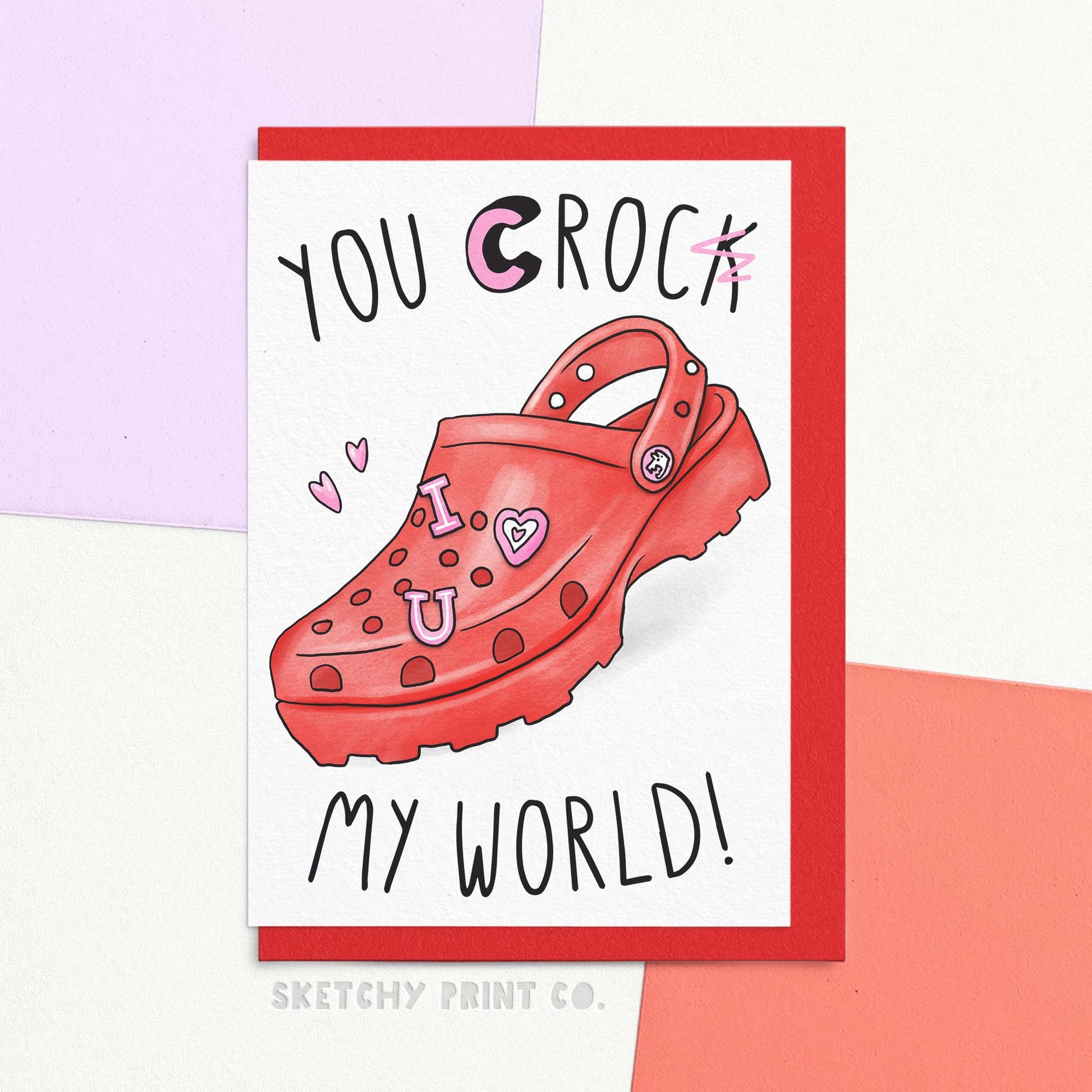 Funny anniversary card for husband or wife. Funny Valentine's Day card reading you croc my world! with the k scribbled out.