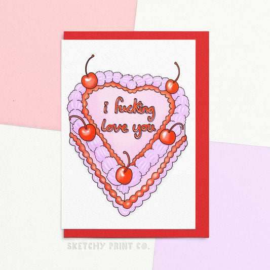 Funny Valentine's Day Card reading I f-ing love you on a cute red and pink heart shaped cake! Surprise your significant other with the perfect funny and rude Valentine's Day card! Show your love with a heart-shaped cake that comes with a naughty message, making it the ideal Valentine's card for your boyfriend or girlfriend. A playful and quirky way to express your affection. Warning: Please do not eat this delicious looking card!