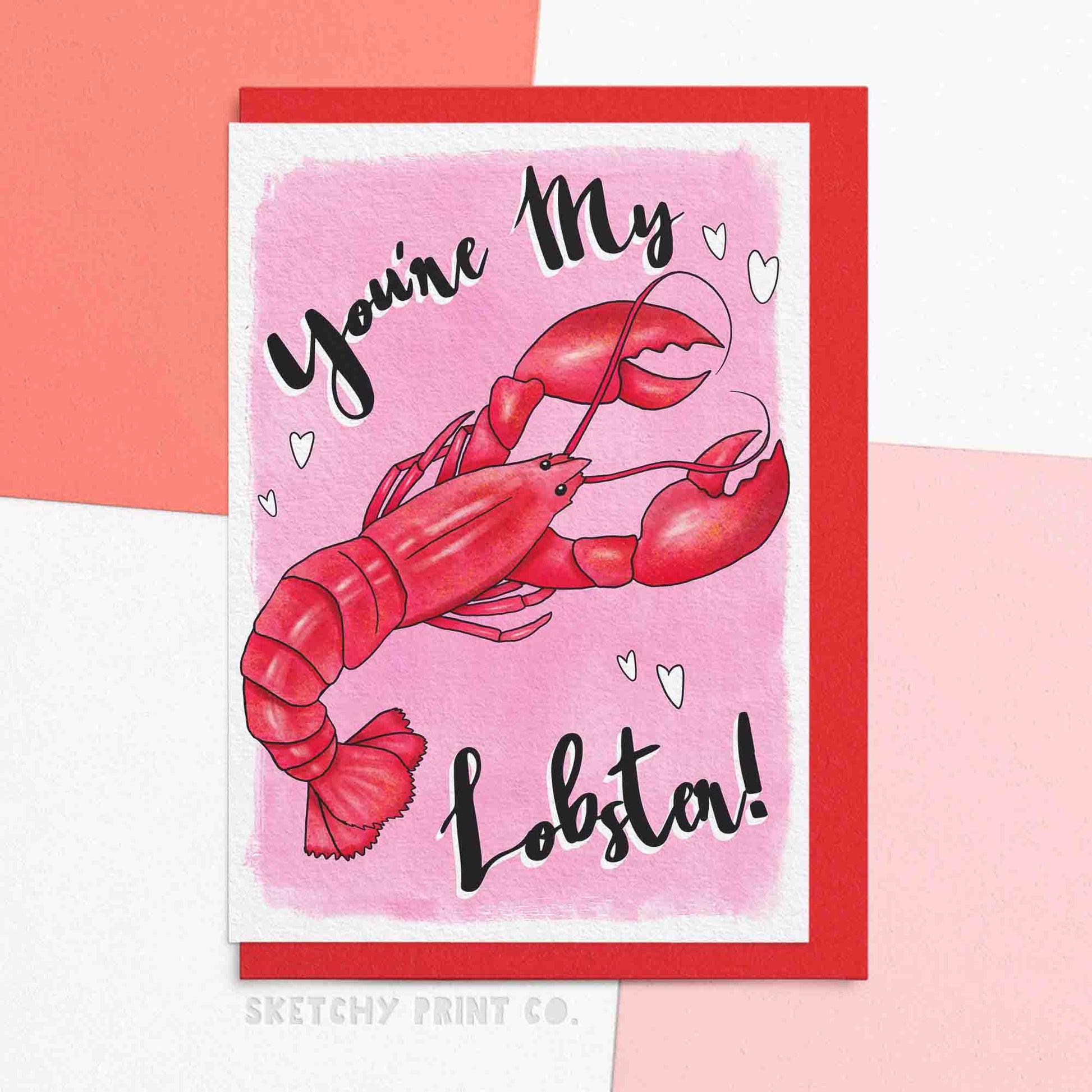 Funny Valentines card for boyfriend or girlfriend reading you're my lobster! A red lobster with a pink background and white hearts. FSC certified paper card with matching red envelope.