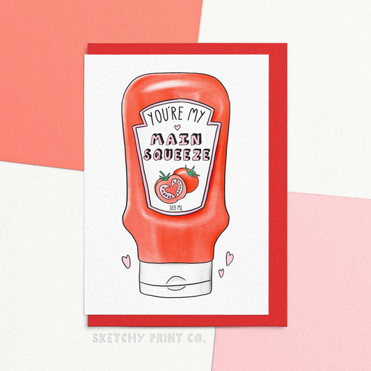 Funny Valentines Day card reading you're my main squeeze written on a cute illustration of  tomato sauce aka ketchup bottle. You say tomato, we say - we have the card for you! Let your main squeeze know that you go together like tomato sauce and, well, EVERYTHING with our funny Valentine's Day Card. Designed and printed in our Worcestershire studio, on premium thick FSC certified paper, this card is both sustainable and saucy!