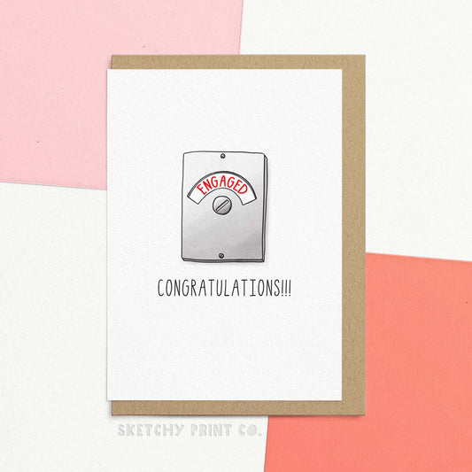 funny wedding wishes card for friend. Engagement greeting card with an illustration of an engaged toilet lock with text saying congratulations. It's the perfect not soppy way of sending engagement wishing and saying congratulations on your engagement!