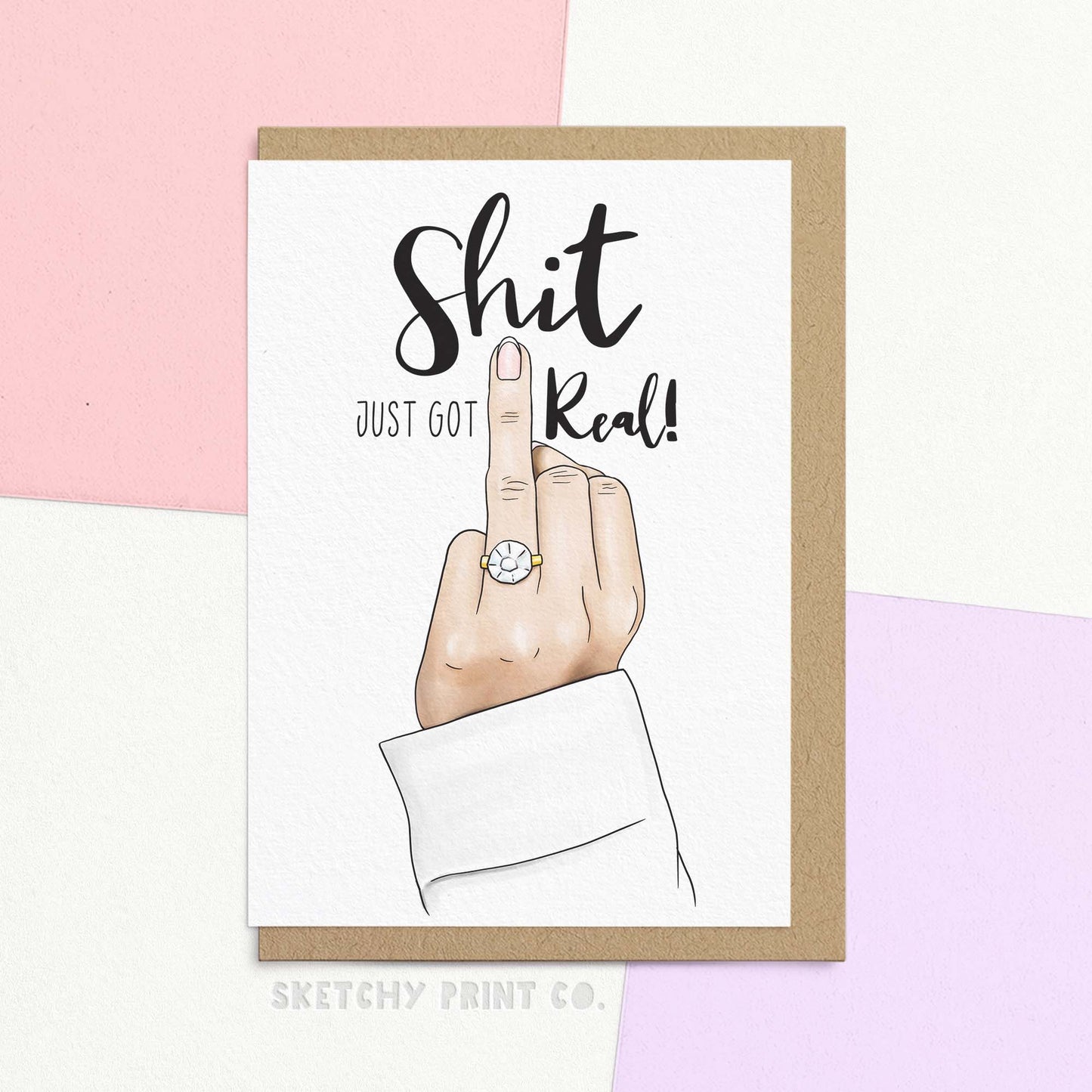 funny wedding wishes or congratulations on your engagement card. Modern wedding greeting for friend. Funny wedding card messages, Funny wedding and engagement card reading 'This just got real!' featuring a white hand holding up the ring finger showing off a sparkly engagement ring.